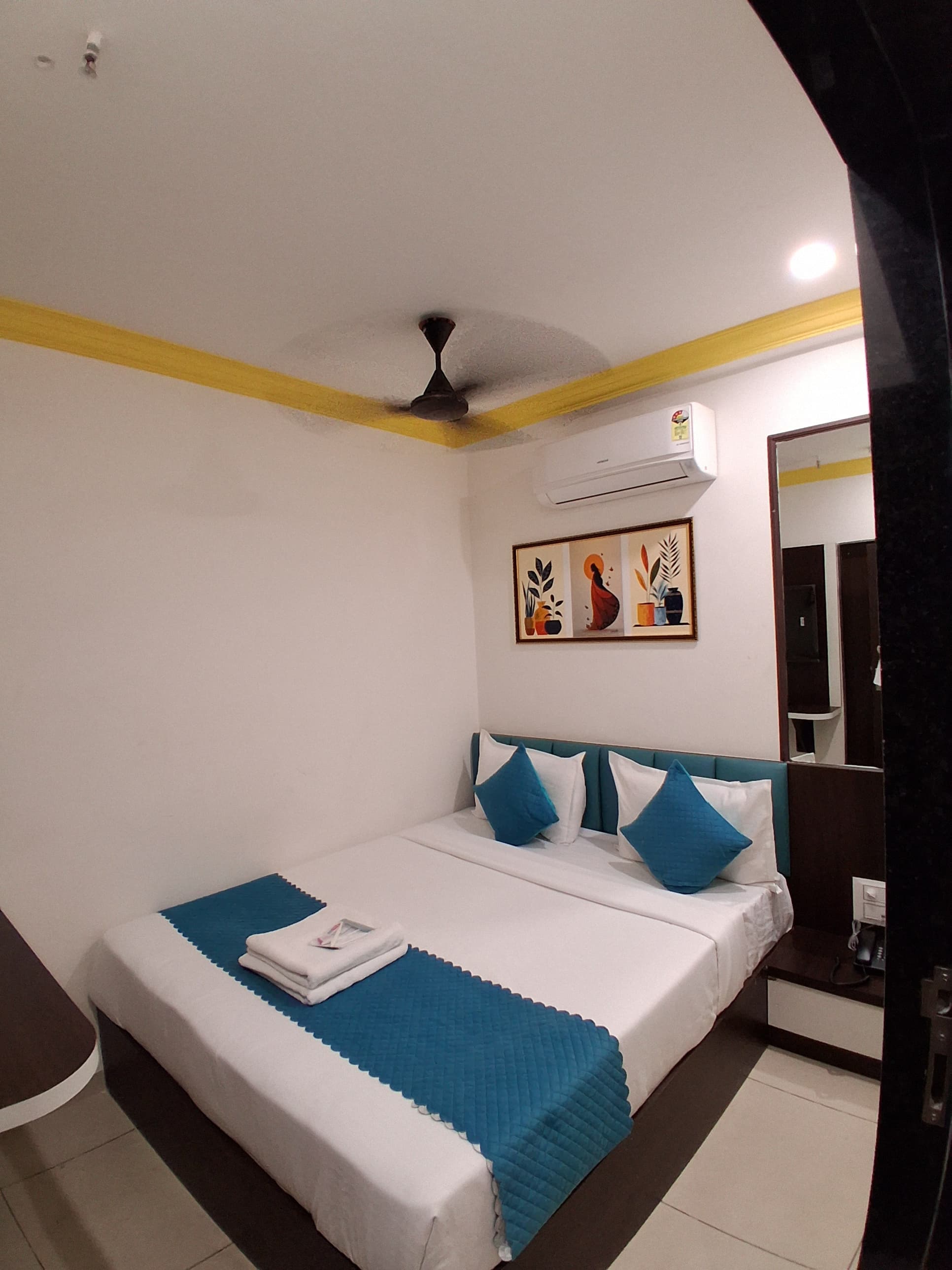 Standard Room second angle showing bed placement and compact stay layout